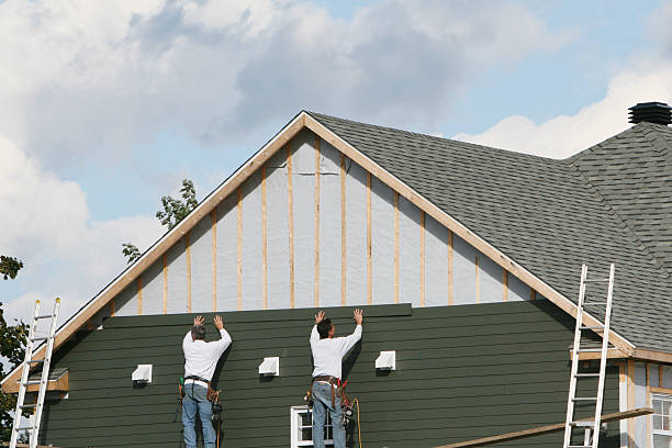 Professional Siding technician working in Corning, OH